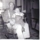 Sam Black with unidentified child